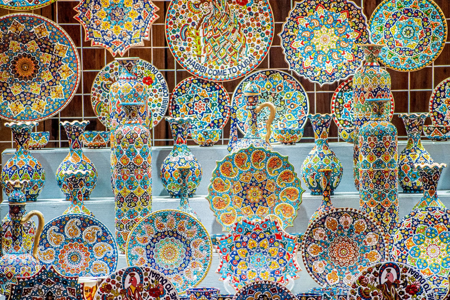 Vibrant handmade ceramics and mosaics beautifully displayed indoors in Dubai.