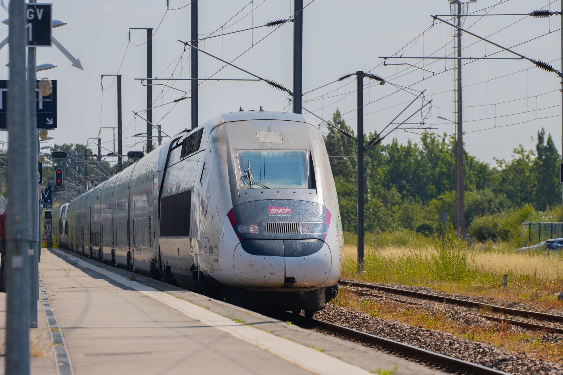 A high-speed SNCF train arriving at Dol-de-Bretagne station, Brittany, France.
